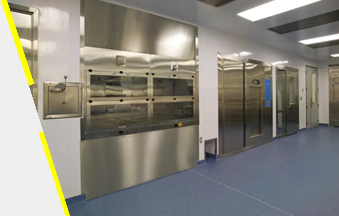 A large metal oven in the middle of a room.